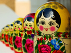 Matryoshka dolls sitting in a row.